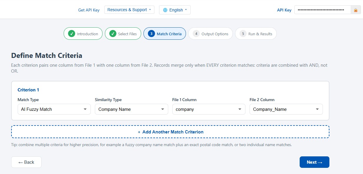 Merge Wizard match criteria step showing two criterion cards joined by an AND connector, one AI fuzzy company name match and one exact match